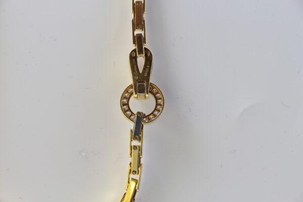 Bracelet Cartier Agrafe en or jaune et diamants